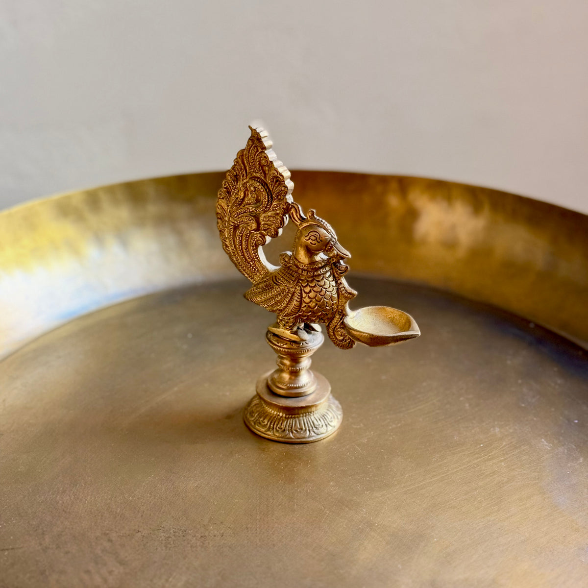 Intricately Crafted Brass Peacock Diya