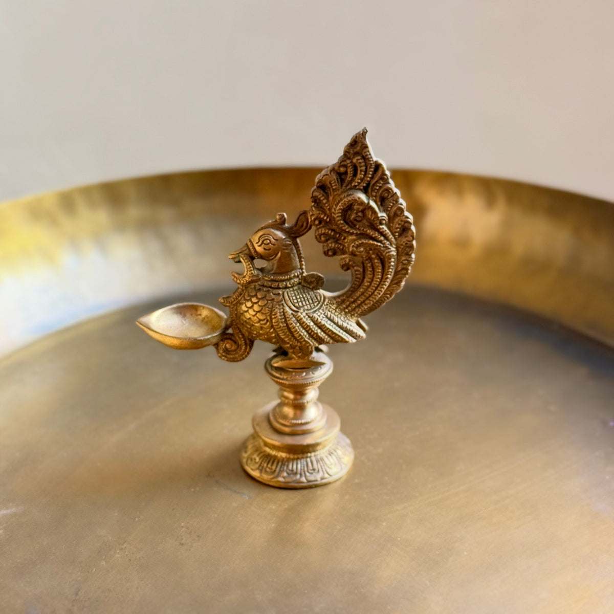 Intricately Crafted Brass Peacock Diya