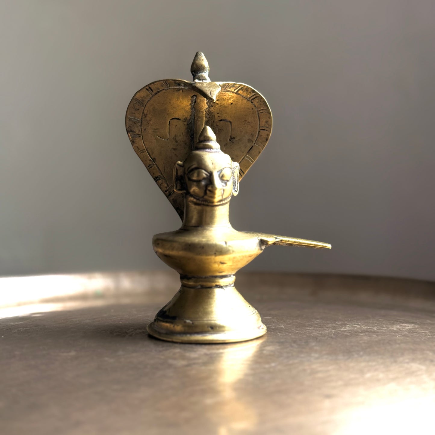 Rare 19th-Century Brass Mukhalinga with Vasuki