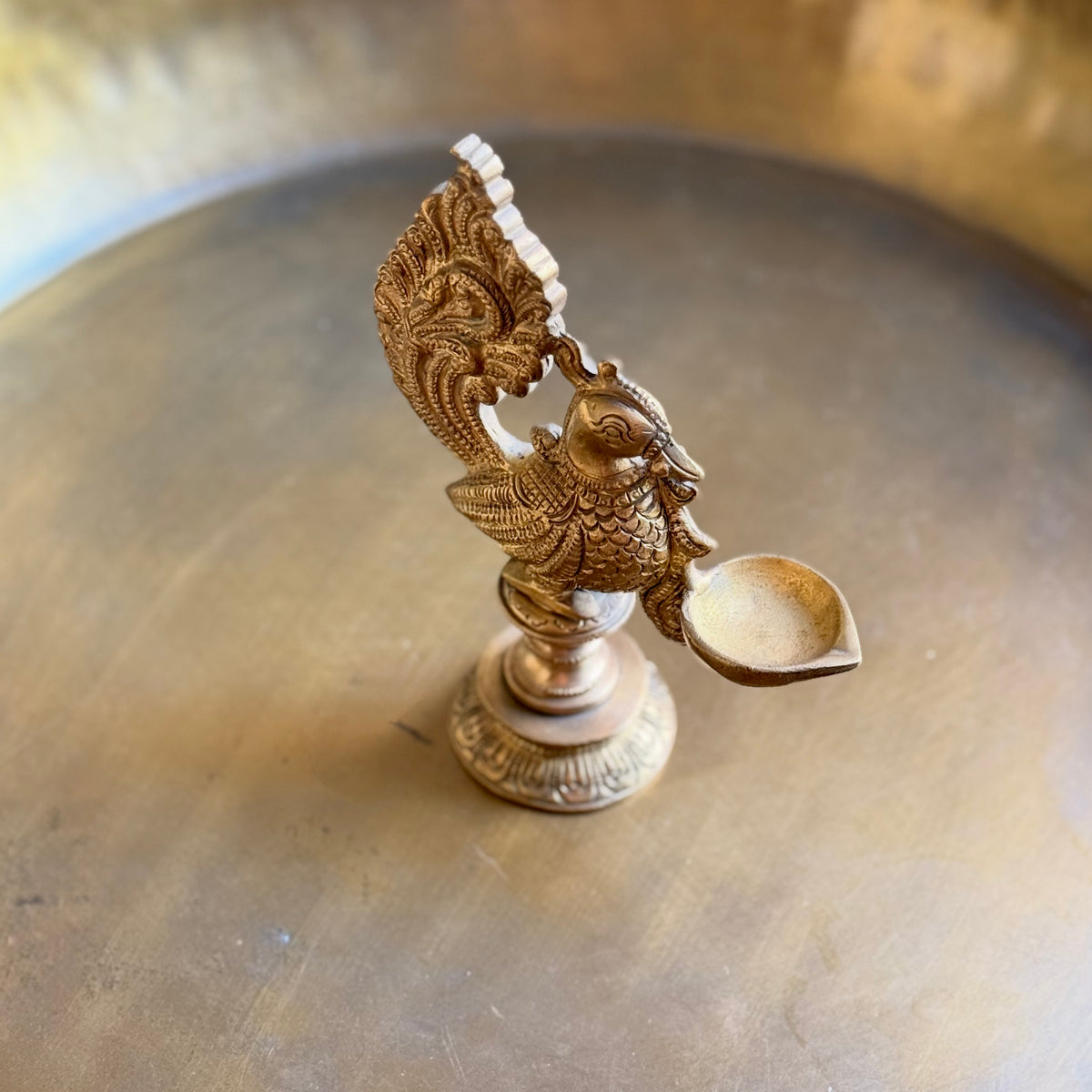 Intricately Crafted Brass Peacock Diya